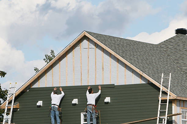 Professional Vinyl Siding technician working in Washington, IN